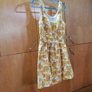 Cute golden roses on flirty white minidress